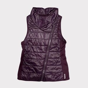REEBOK WOMANS Purple diagonal zip puffer vest with pockets Medium